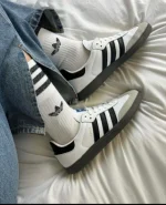 کتونی آدیداس سامبا سفید مشکی با رویه چرم و زیره آدامسی