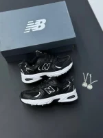 کتونی نیوبالانس ۵۳۰ مشکی کلاسیک با رویه چرم و مش و زیره مقاوم