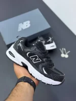 کتونی نیوبالانس ۵۳۰ مشکی کلاسیک با رویه چرم و مش و زیره مقاوم