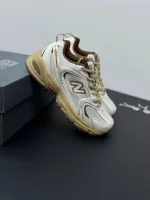 کتونی نیوبالانس ۵۳۰ سفید قهوهای با رویه چرم و مش و زیره مقاوم