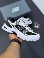 کتونی نیوبالانس ۵۳۰ مشکی سفید با رویه چرم و مش و زیره مقاوم