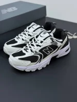 کتونی نیوبالانس ۵۳۰ مشکی سفید با رویه چرم و مش و زیره مقاوم