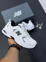 کتونی نیوبالانس ۵۳۰ سفید و مشکی با رویه چرم و مش و زیره مقاوم