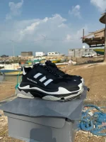 کتونی بالنسیاگا آدیداس با طراحی منحصر به فرد و رنگبندی جذاب، همراه با فول پک شامل شناسنامه، شوز بگ و بند اضافی