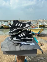 کتونی بالنسیاگا آدیداس با طراحی منحصر به فرد و رنگبندی جذاب، همراه با فول پک شامل شناسنامه، شوز بگ و بند اضافی