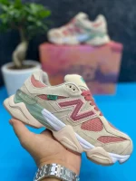 کتونی نیوبالانس 9060 به رنگ صورتی با طراحی مدرن و جذاب