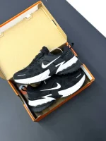 کتونی نایکی وی تو کی ران مشکی سفید با رویه مشبک و طراحی یکدست