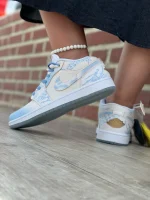 کتونی جردن ۱ لو سال اژدها با رویه چرم سفید و روکش سبز اژدهایی