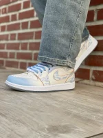 کتونی جردن ۱ لو سال اژدها با رویه چرم سفید و روکش سبز اژدهایی