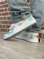 کتونی جردن ۱ لو سال اژدها با رویه چرم سفید و روکش سبز اژدهایی