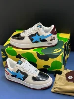 کتونی بیپ مارول راکت راکون بژ و مشکی با جزئیات آبی و قهوه‌ای در پس‌زمینه روشن