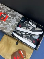 کتونی بیپ هیوگو مشکی با چرم براق و لوگوی نقرهای در پسزمینه روشن