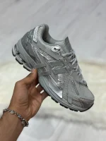 کتونی نیوبالانس ۱۹۰۶A خاکستری با رویه مش و چرم خاکستری، Swoosh سفید و زیره ABZORB